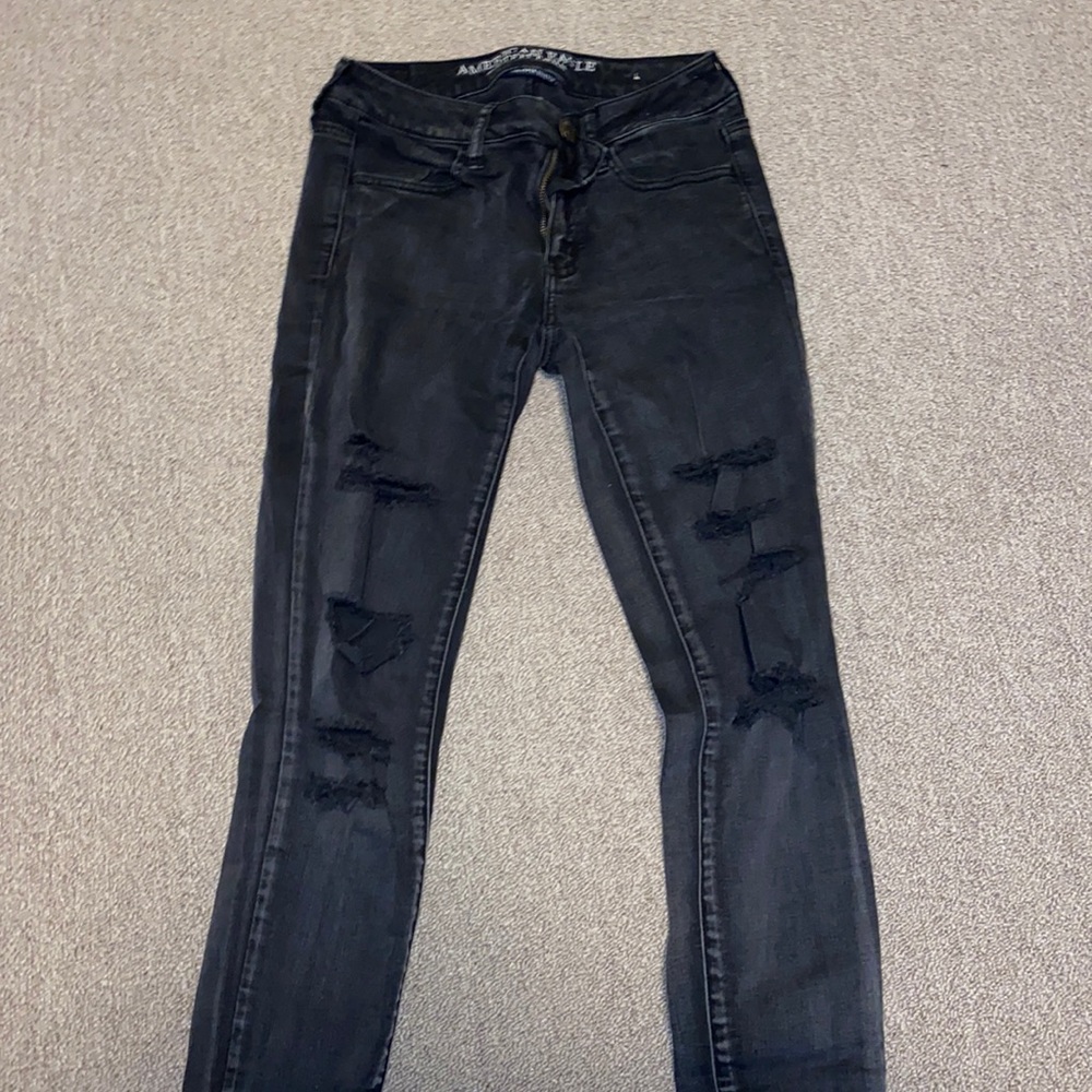 black ripped jeans